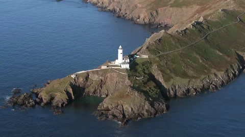 Aerial view of Start Point and lighthouse, Devon, England Stock Footage 251581844