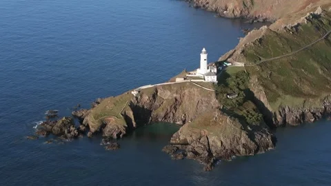 Aerial view of Start Point and lighthouse, Devon, England Stock Footage 251582466