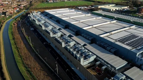Aerial view of a state-of-the-art data storage facility and tech hub in Waltham Stock Footage 335024166