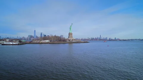 Aerial view of Statue Liberty on background of New York. Video stock 237610641