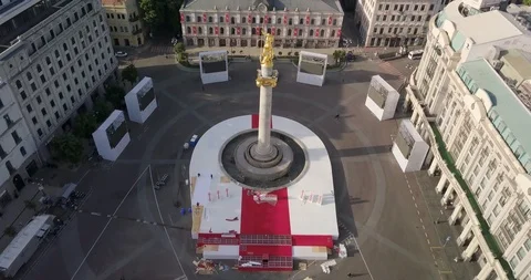 Aerial view of statue of Saint George and stage constructions from overhead Stock Footage 108600639