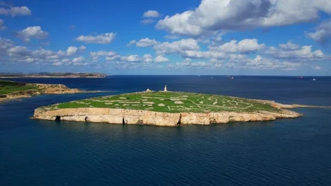 Aerial view of statue of Saint Paul on an isolated island summer day on Malta Video stock 332499989