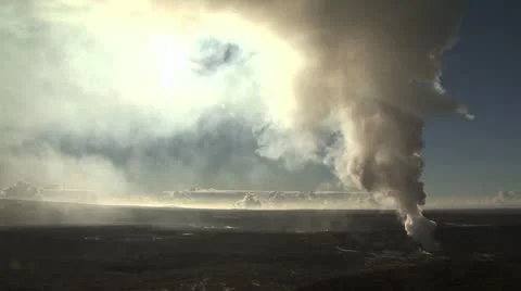 Aerial View Of Steam Cloud Rising From A Volcanic Crater And Clouding The Sun. 動画素材 19290818
