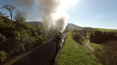 Aerial view of steam engine train locomotive. smoking smoke fog Stock Footage 64541581
