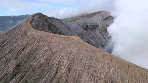 Aerial view of steaming Mount Bromo volcanic crater in East Java, Indonesia Stock-Footage 317504606