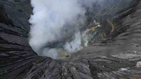 Aerial view of steaming Mount Bromo volcanic crater in East Java, Indonesia Vídeos de archivo 337566650