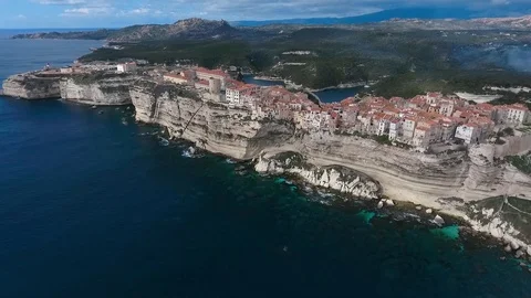 Aerial view of the steep cliffs and the city of Bonifacio on the island of Co Stock Footage 112445007