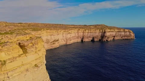 Aerial View of Steep Limestone Cliffs and Blue Ocean Stock Footage 339136818