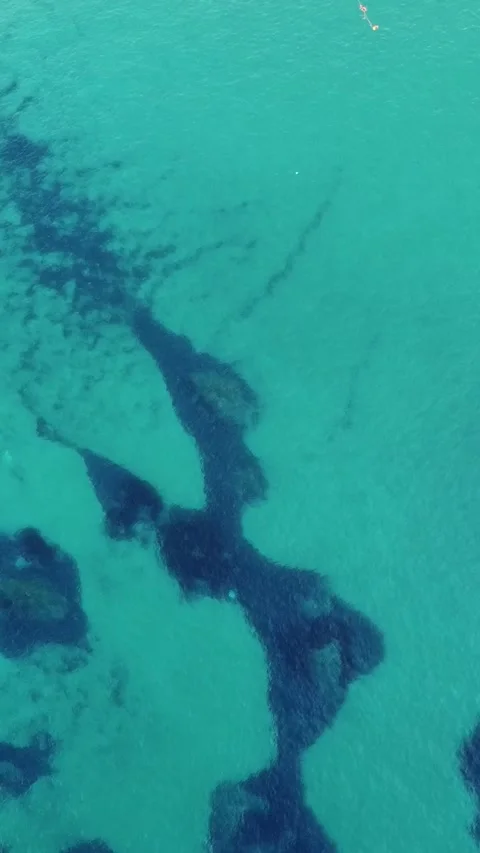 Aerial view of steep white limestone cliffs and blue Mediterranean sea on t.. Video stock 327034868