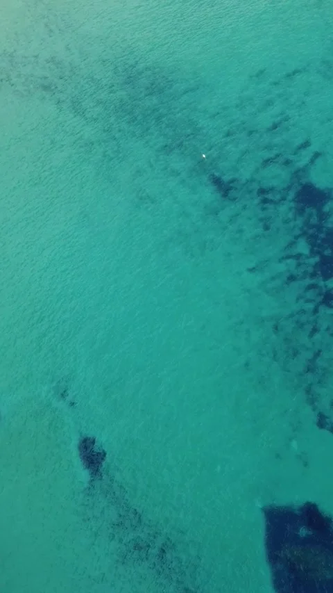Aerial view of steep white limestone cliffs and blue Mediterranean sea on t.. Stock Footage 327034882