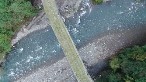 Aerial view stone Bridge over the mountain river, Abkhazia. Stock Footage 315208173