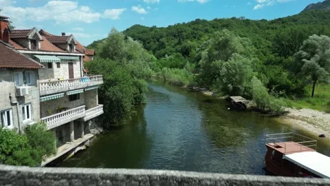 Aerial view of the stone bridge in Rijeka Crnojevica, Montenegro Stock Footage 338025901