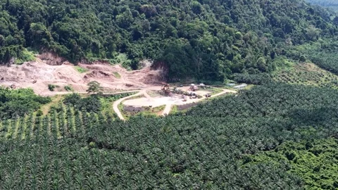 Aerial view of a stone mining site from a rocky mountain surrounded by oil .. Stock-Footage 337015495