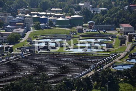 Aerial view of storage tanks in sewage water treatment plant Stock Photos