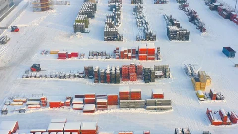 Aerial view of a storage yard of modern bright building and structural materials Stock Footage 101037768