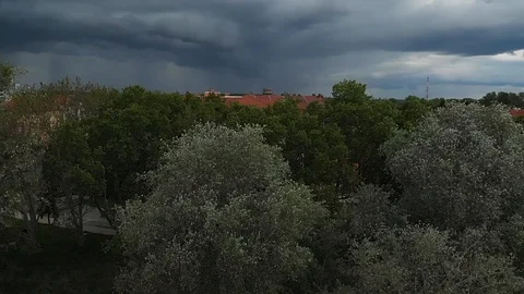 Aerial view of storm clouds over the city in the background Dlog Stock Footage 127037058