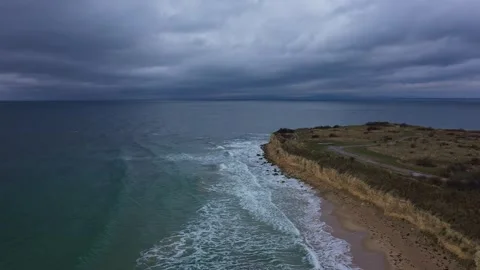 Aerial view to a stormy clouds over beautiful beach 스톡 동영상 296059458