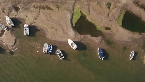Aerial view of stranded boats on exposed Danube riverbank during low water Vídeos de archivo 342751323