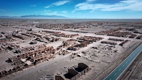 Aerial view of the streets of Ghost Town, Aksai Oil Town, Jiuquan, Gansu, China. Stock Footage 325082663