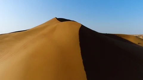 Aerial view of strong shadows created by desert landscape, U.A.E. Stock Footage 103054928