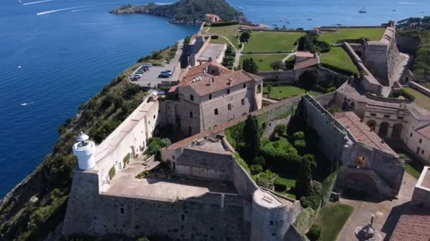 Aerial view of the structure in Monte Argentario with the island Stock Footage 253127726