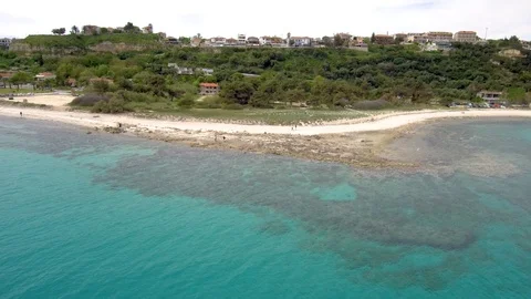 Aerial view of stunning  beach under a tourist village, Athitos Halkidiki Greece Stock Footage 112703814