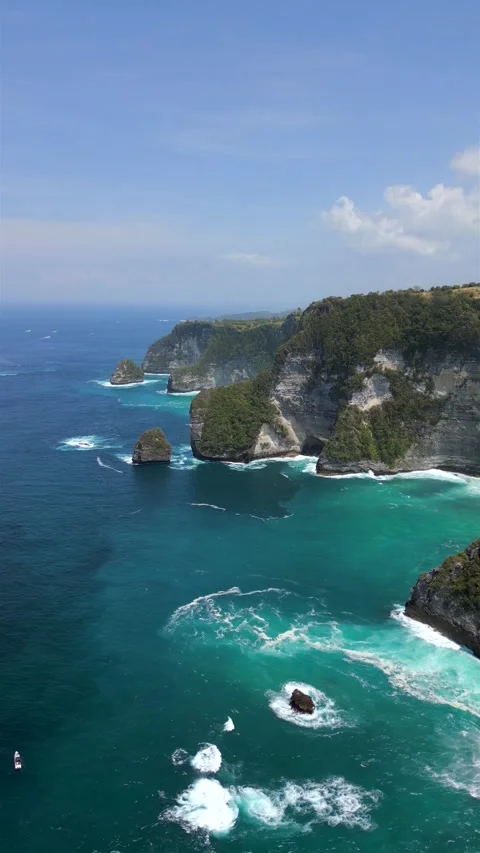 Aerial view of stunning cliffs and ocean waters on Nusa Penida, Bali, Indonesia Stock Footage 287187706