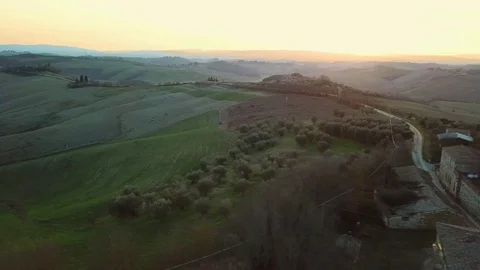 Aerial view, stunning flight over the green Tuscany Hills at sunset Stock-Footage 103278046