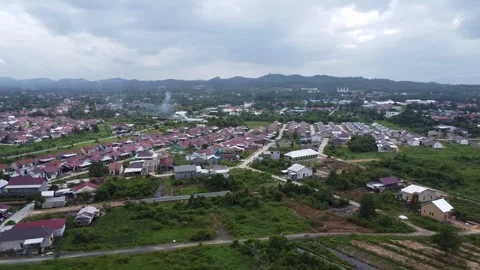 Aerial view of subsidized housing development in South Kalimantan Stock Footage 285584691