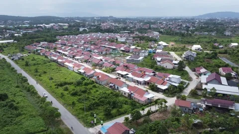 Aerial view of subsidized housing development in South Kalimantan Stock Footage 285588534