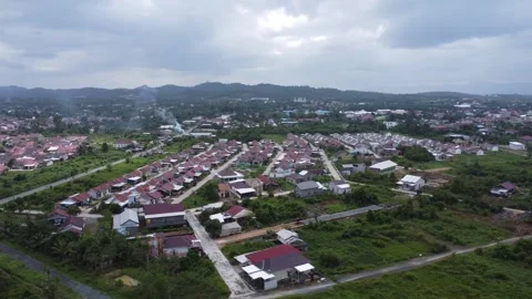 Aerial view of subsidized housing development in South Kalimantan Stock Footage 285589517