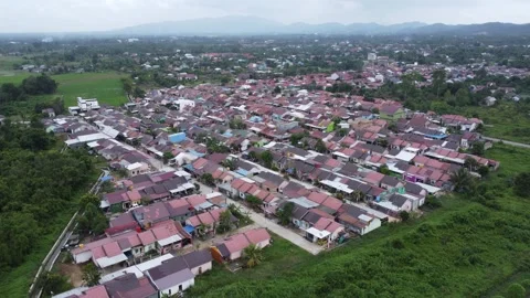 Aerial view of subsidized housing development in South Kalimantan Stock Footage 285589601