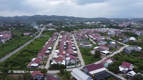 Aerial view of subsidized housing development in South Kalimantan Stock Footage 285590104