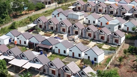 An aerial view of subsidized housing featuring a minimalist Scandinavian de.. Видео 345382835