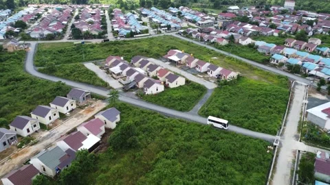 Aerial view of subsidized housing which is neatly arranged on very large land Stock Footage 279564505