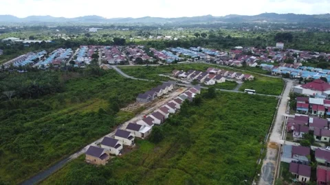 Aerial view of subsidized housing which is neatly arranged on very large land Stock Footage 279564585