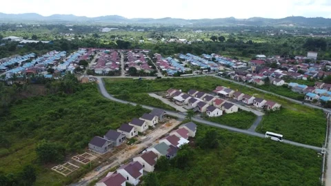 Aerial view of subsidized housing which is neatly arranged on very large land Stock Footage 279564586