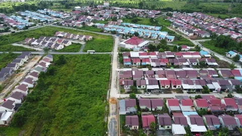 Aerial view of subsidized housing which is neatly arranged on very large land Stock Footage 279565531