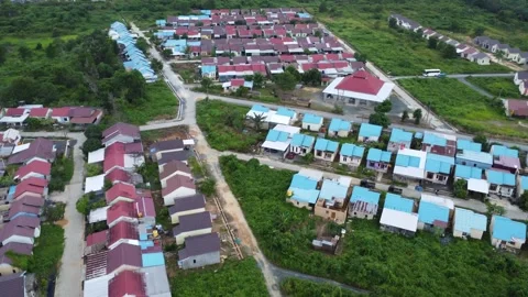 Aerial view of subsidized housing which is neatly arranged on very large land Stock Footage 279565777