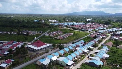 Aerial view of subsidized housing which is neatly arranged on very large land Stock Footage 279569321