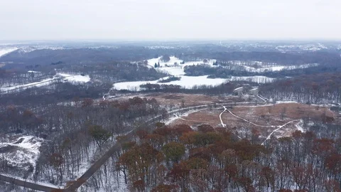 Aerial view of suburb, trees covered first snow. Stock Footage 119908982