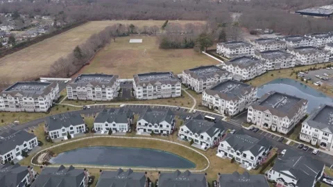 Aerial view of suburban apartment complex and community clubhouse 스톡 동영상 327319385