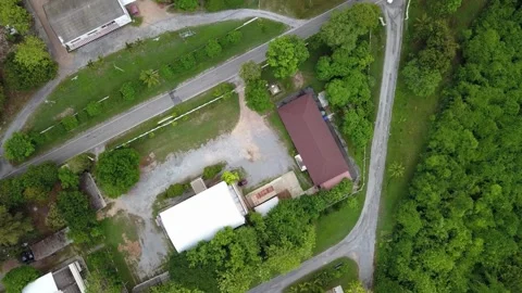 Aerial View of Suburban Building Complex and Surrounding Greenery Stock Footage 310217021