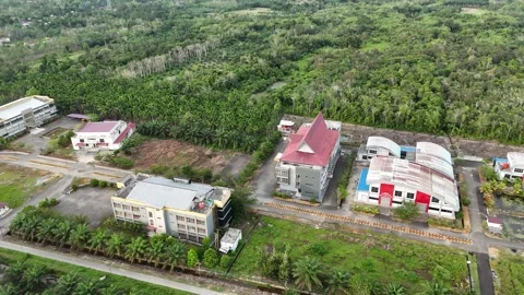 Aerial View Of Suburban Building Complex And Green Landscapes Stock Footage 329857314