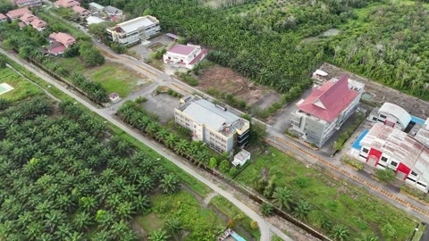 Aerial View Of Suburban Building Complex And Green Landscapes Stock Footage 329858110
