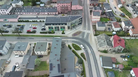 Aerial view of suburban road intersection with traffic – 4K ProRes Stock Footage 334563570