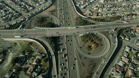 Aerial view of suburban traffic on busy freeway Stock Footage