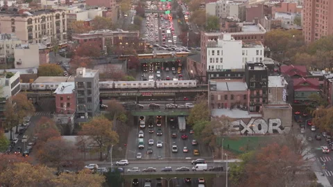 Aerial view of the subway passing through Brooklyn Stock Footage 294262331