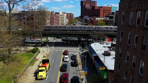 Aerial View of a Subway Train on a Bridge in the Bronx, New York Stock Footage 129794029