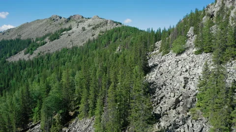 Aerial view of Suka mountain range in Ural, drone flies near stones and boulders Stock Footage 138003611